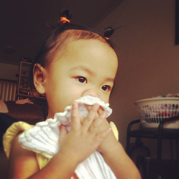 A toddler with a runny nose